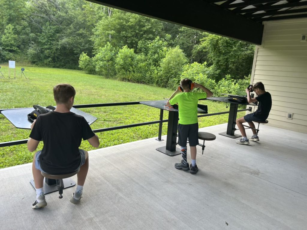 Students practicing their marksmanship on the rifle range