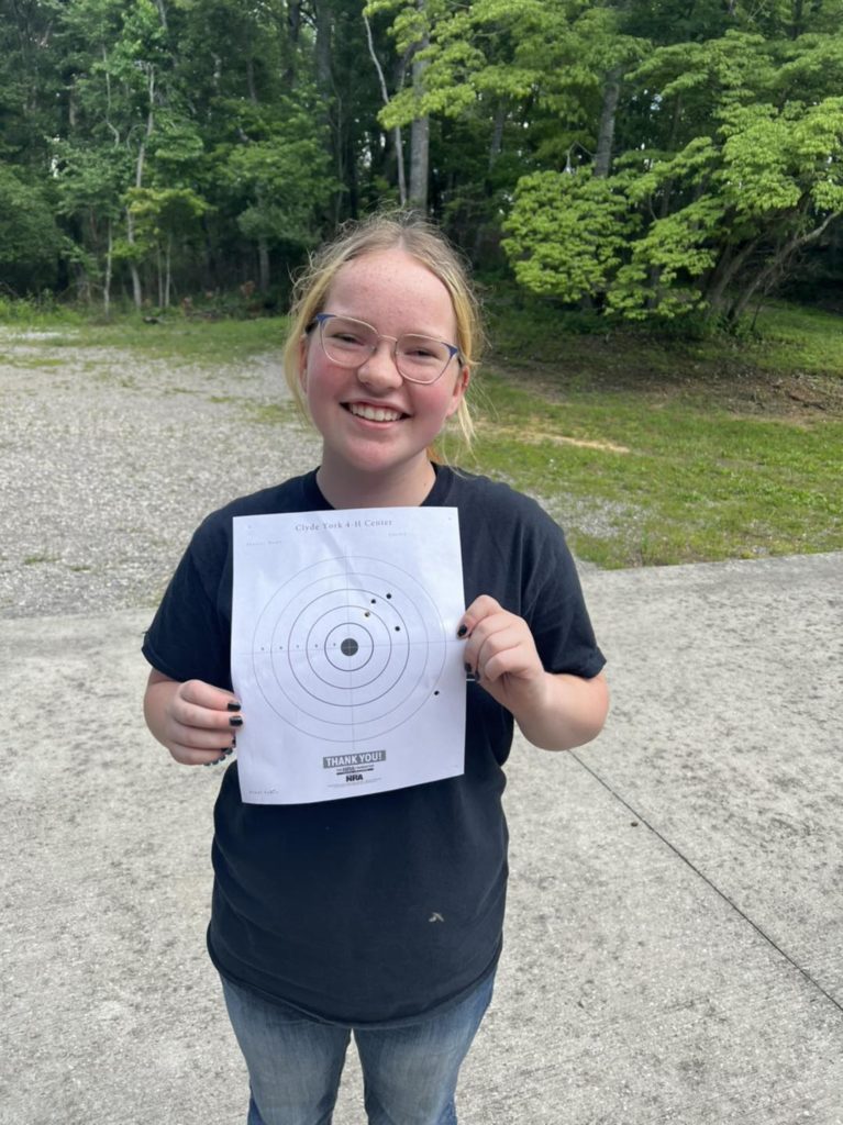Child holding up used target