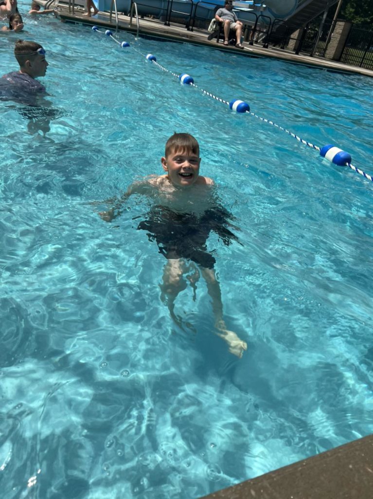 Student swimming in the pool