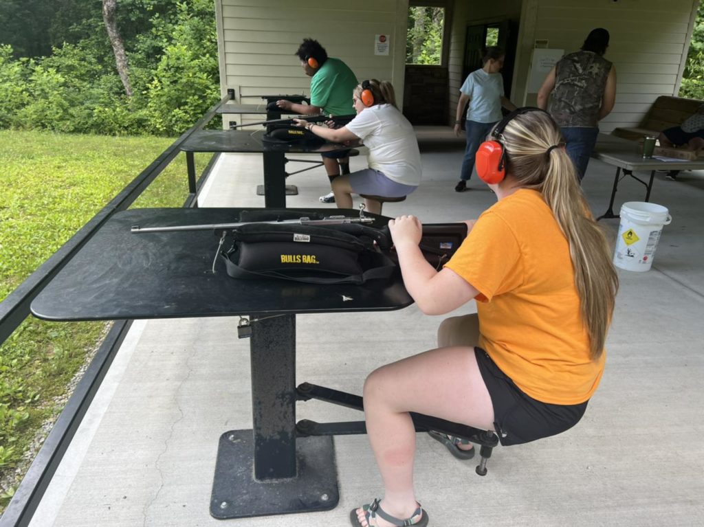 Students practicing their marksmanship on the rifle range